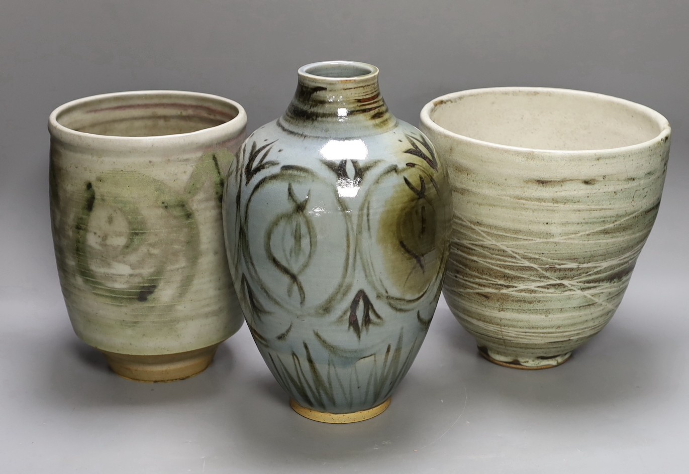 Two studio pottery vases and a lamp base, tallest 28cm